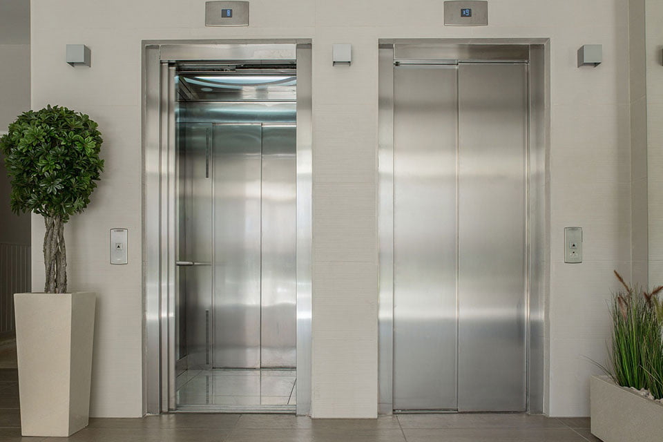 What are the benefits of Enclosed Elevator Lobbies