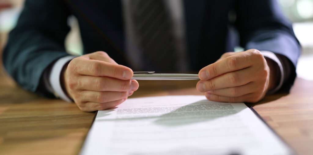 small business owner reviewing professional indemnity insurance policy