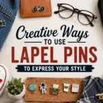 Stylish collection of custom lapel pins on a blazer, denim jacket, hat, and backpack showcasing creative ways to express personal style through fashion accessories.