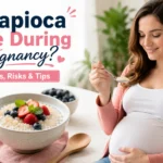 Pregnant woman enjoying a bowl of cooked tapioca with fresh berries, illustrating the safety and benefits of eating tapioca during pregnancy.