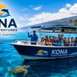 Guests enjoying a Kona Ocean Adventures snorkeling tour in the crystal-clear waters of Hawaii's Big Island