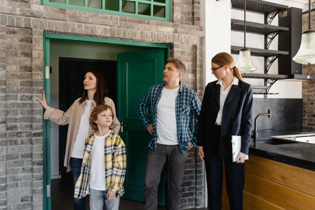 Smart buyer reviewing a home purchase checklist with house, keys, and calculator to secure the right home at the right price through property due diligence.