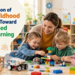 Teacher helping preschool children explore play-based STEM learning through building blocks, robotics, and hands-on educational activities in a modern early childhood classroom.