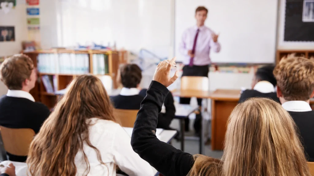 Students in a Scottish classroom learning with their teacher