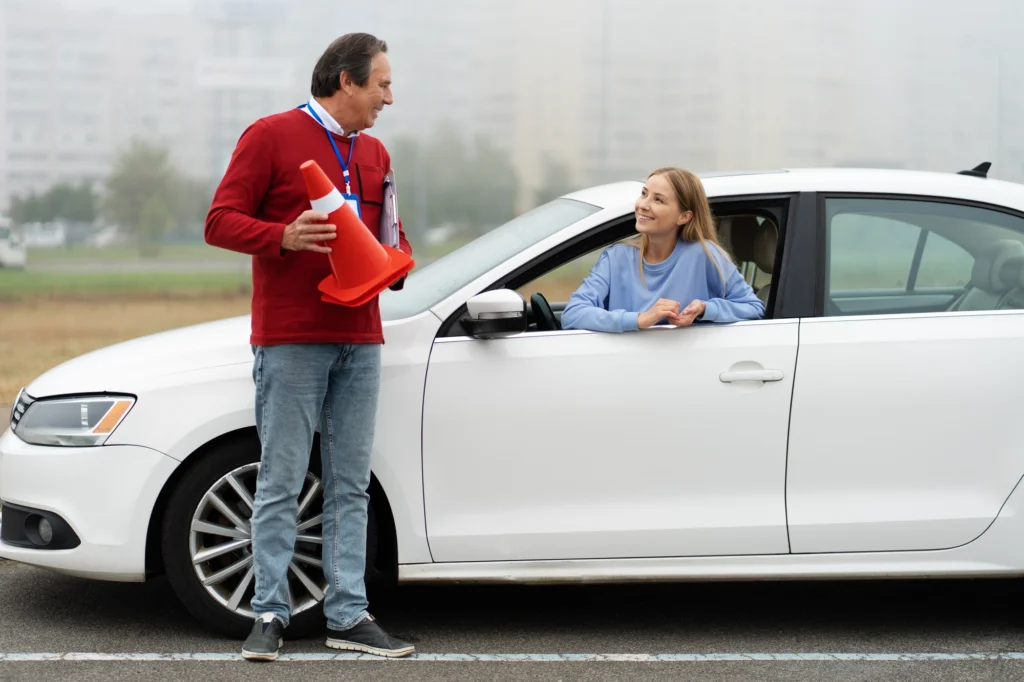 Driver talking with a vehicle professional beside a car during a move