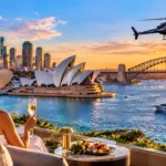 Unforgettable luxury travel experience in Sydney overlooking the Opera House and Harbour Bridge at sunset