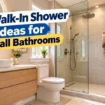 Walk-in shower ideas for small bathrooms featuring a modern frameless glass enclosure and neutral tiles.