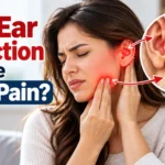 Can ear infection cause jaw pain? A woman experiencing ear and jaw discomfort with a medical illustration showing an inflamed ear and jaw joint.