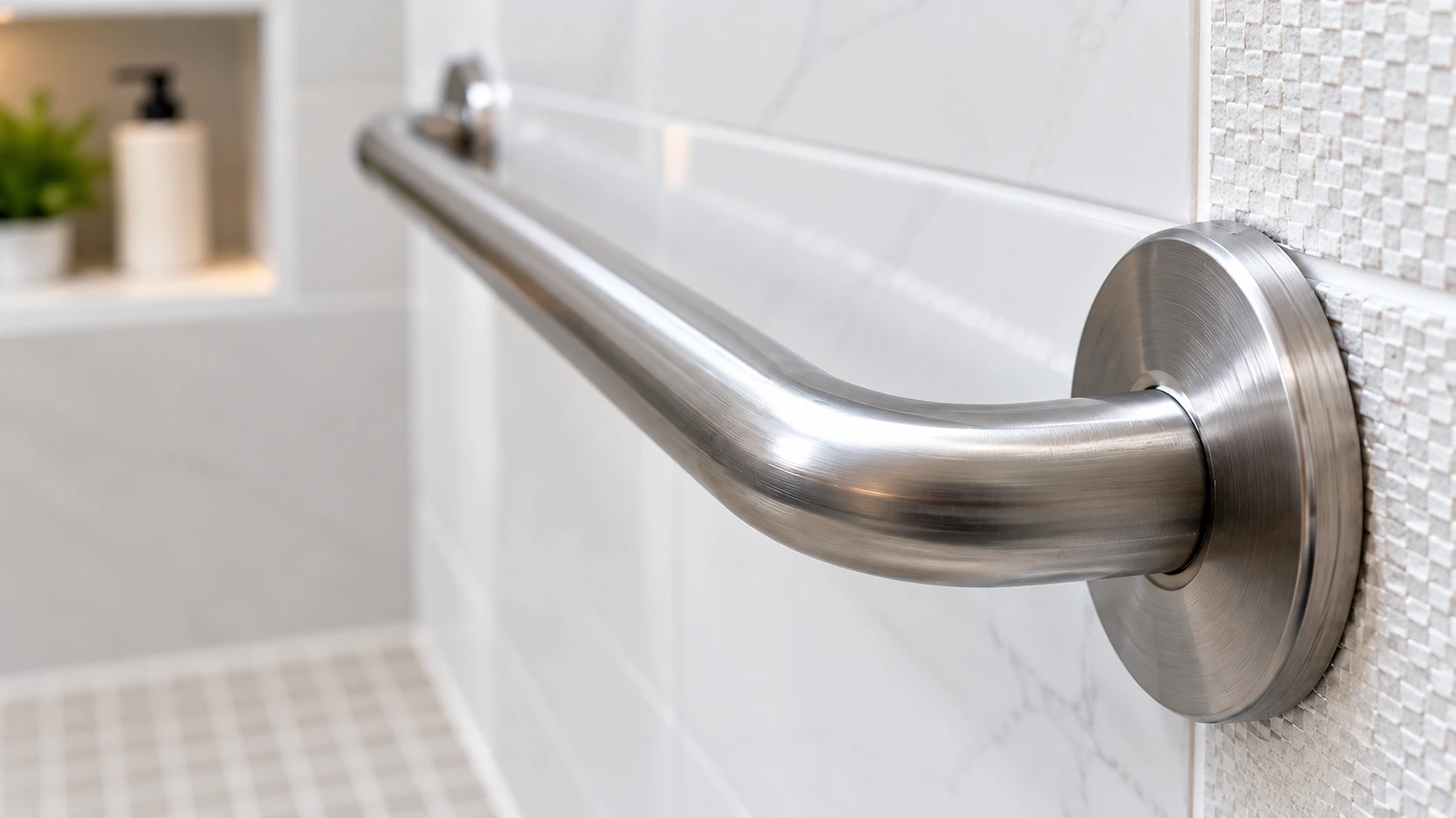 Stainless steel bathroom safety grab bar mounted on tiled wall for improved support and accessibility